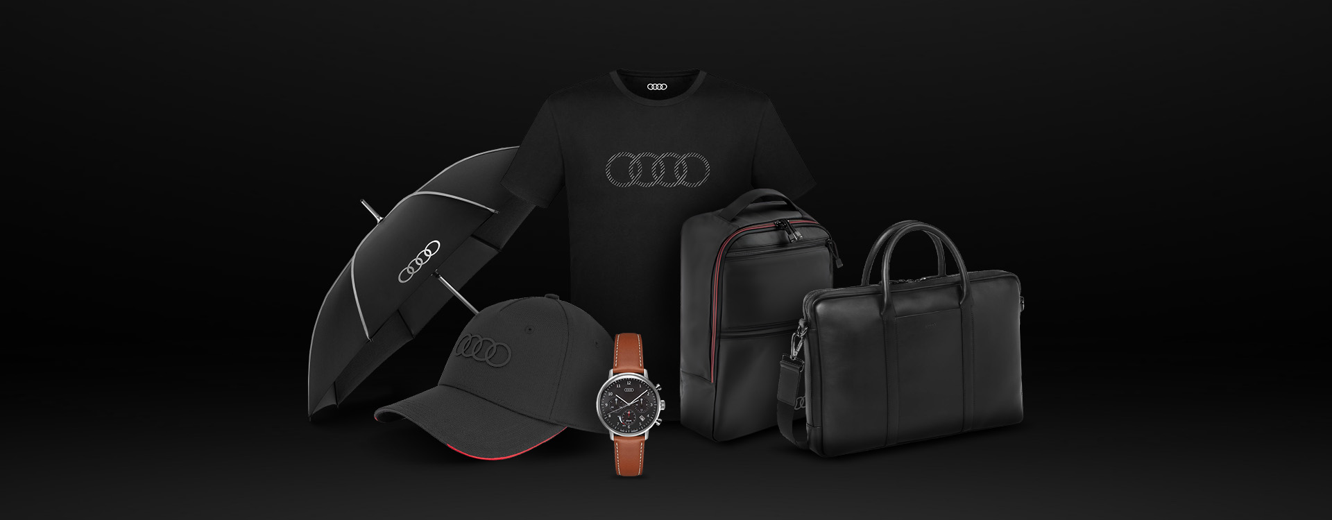 Černý deštník, černá kšiltovka, černý batoh, černá taška s logem Audi a hnědé hodinky